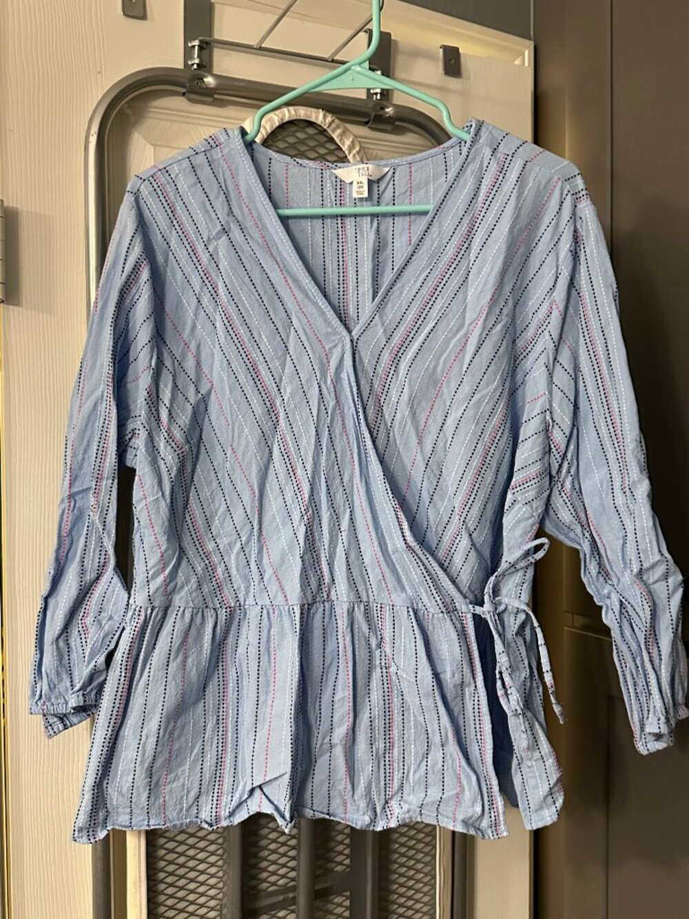 light blue faux wrap blouse